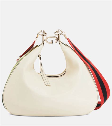 gucci attache white